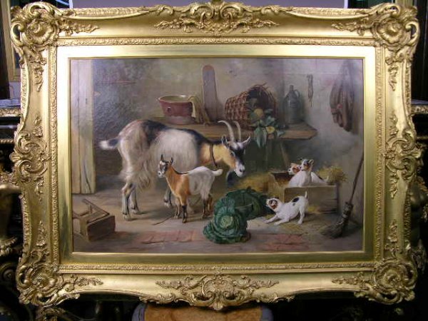 EDGAR HUNT OIL ON CANVAS WITH GOLD FRAME .: EDGAR HUNT(BRITISH:1876-1953). OIL ON CANVAS WITHS ORIGINAL 19 TH CENTURY GOLD GILT FRAME, A BEAUTIFUL BARN YARD SCENE WITH THREE DOGS AND A GOAT WITH A YOUNG SHEEP. SIGNED "E. HUNT 1906". VIEWING ARE