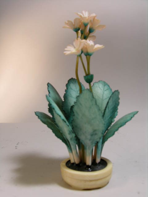 IVORY BEAUTIFUL JAPANESE "IKEMONO" FLOWERS. SIGNE: IVORY BEAUTIFUL JAPANESE "IKEMONO" FLOWERS. SIGNED. HEIGHT 6". INTERNATIONAL SHIPPING IS NOT AVAILABLE FOR THIS ITEM. THIS ITEM WILL ONLY BE SHIPPED WITHIN THE UNITED STATES. WE DO NOT VIOLATE ANY FIS