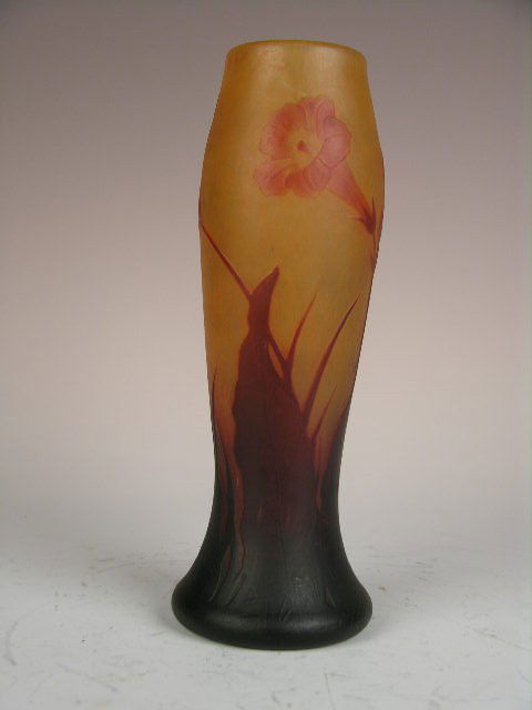 DAUM NANCY CAMEO VASE.: A VERY NICE DAUM NANCY CAMEO VASE DECORATED WITH LONG SLENDER STEMS AND FLOWERS.SIGNED "DAUM NANCY" IN CAMEO.HEIGTH 9 1/8".