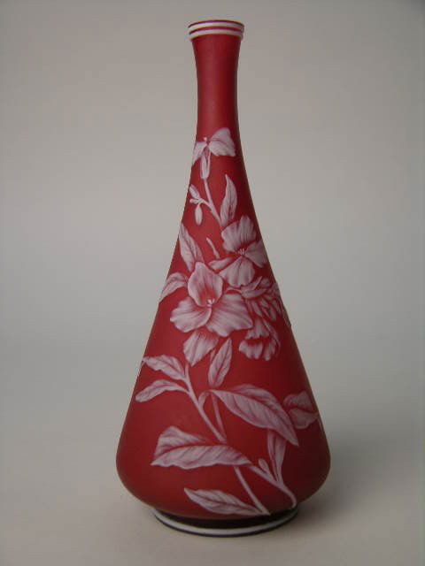 THOMAS WEBB AND SONS CAMEO ART GLASS VASE.: A VERY NICE SHAPED THOMAS WEBB AND SONS CAMEO ART GLASS VASE WITH CAMEO BUTTERFLY ON A LIGHT RED GROUND.HEIGHT 8".