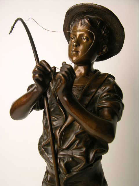 ADOLPHE JEAN LAVERGNE BRONZE FISHERMAN.: ADOLPHE JEAN LAVERGNE (FRENCH: 1852-1901). A VERY NICE AND WELL DONE BRONZE FISHERMAN BAITING HIS HOOK IN A RICH BROWN PATINA. SIGNED "LAVERGNE" IN THE BRONZE. THE FRONT PLAQUE READS "PECHEUR PAR LAVE
