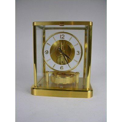 LE COULTRE ATMOS CLOCK.: A VERY NICE 13 JEWELS SWISS LE COULTRE ATMOS PERPETUAL CLOCK WITH A ROUND FACE DIAL. HEIGHT 9".