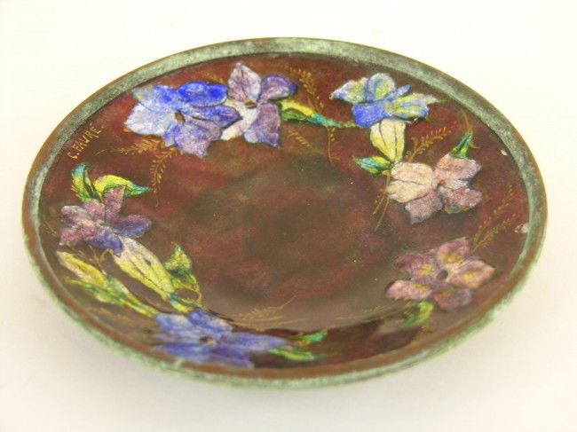 CAMILLE FAURE(FRENCH 1874-1950) SMALL DISH.: CAMILLE FAURE(FRENCH 1874-1950).ENAMELED ON COPPER SMALL DISH DECECORATED WITH FLOWERS ALL AROUND. SIGNED C. FAURE.DIAMETER 4 1/8".
