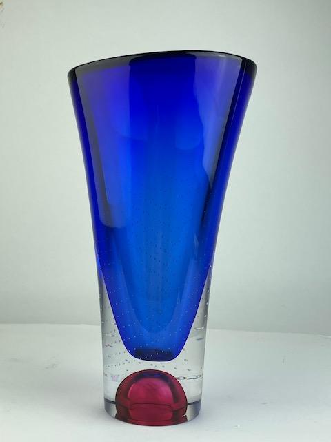 Kosta Boda Goran Warff blue crystal glass vase.: Kosta Boda Goran Warff blue crystal glass vase.Sweden.Signed to the bottom edge.Height 10 1/4 inches. Diameter 5 1/2 inches.CIrca 1970-1999.