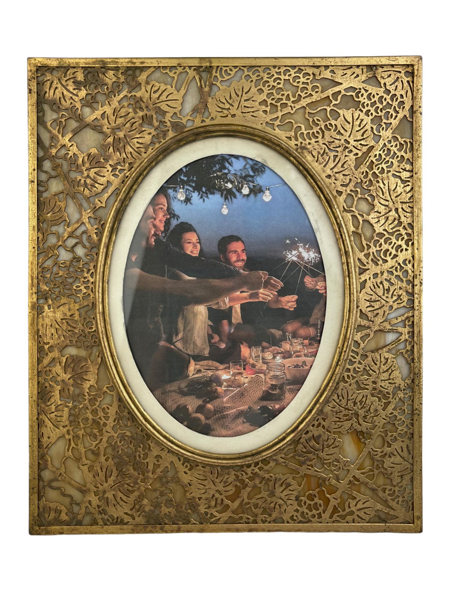 Tiffany Studios oval picture frame in the Grapevine pattern with amber glass. (1 of 7)