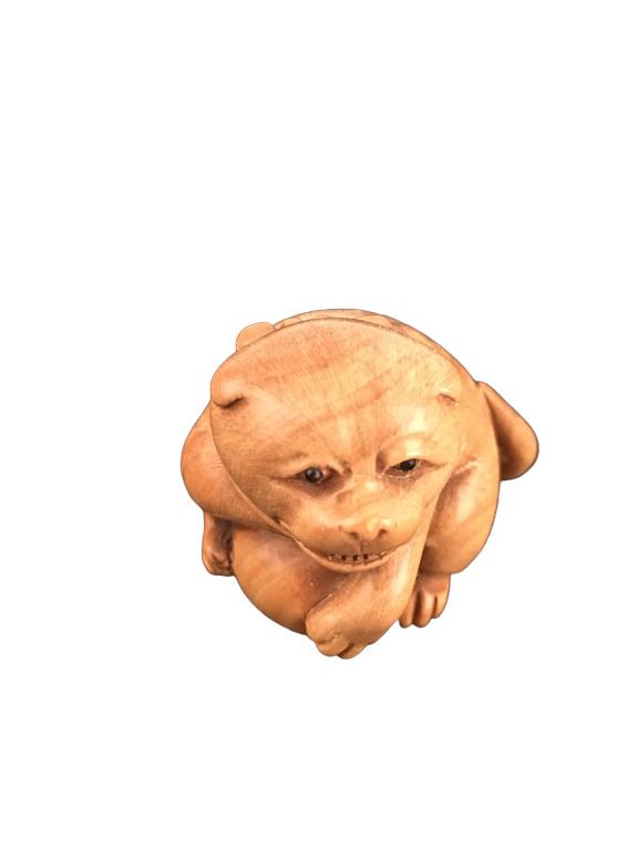 Carved netsuke figure.: Carved netsuke figure. Height 1 1/2 inches.