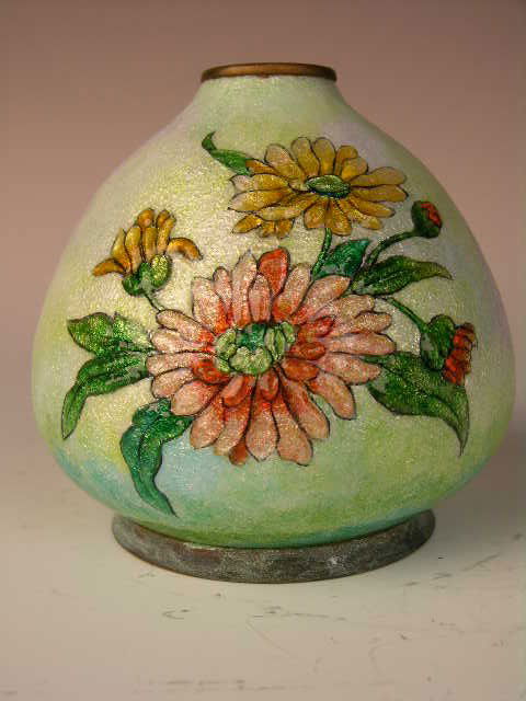 CAMILLE FAURE (CAMILLE FAURE:FRENCH 1874-1956) ENA: CAMILLE FAURE (CAMILLE FAURE:FRENCH 1874-1956).A NICE ENAMELED VASE WITH BUNCHES OF FLOWERS.SIGNED "FAURE LIMOGES FRANCE".HEIGHT 4 5/8".