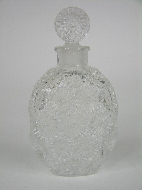 RENE LALIQUE "MARGARITES" PERFUME BOTTLE.: A VERY RARE RENE LALIQUE "MARGARITES" PERFUME BOTTLE. MOLDED "R. LALIQUE FRANCE" ON THE BOTTOM.PRISTINE CONDITION.OVERALL HEIGHT 3 1/4".