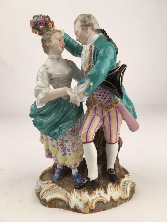 Meissen figurine of a man and lady dancing.: Meissen figurine of a man and lady dancing. Marked on the bottom. Height 6 1/4 inches.
