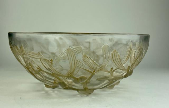 Rene Lalique (French, 1860-1954). "Gui" bowl.: Rene Lalique (French, 1860-1954). "Gui" bowl. "Gui" bowl in clear and frosty glass with a sepia patina. Decorated with mistletoe and berries all around. Marked: R. Lalique also No. 3553. Height 3 7/8 