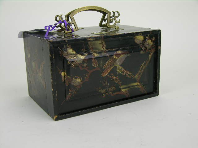 Fine quality Japanese Mahjong set in a three-drawe: Fine quality Japanese Mahjong set in a three-drawer lacquer box decorated with birds and foliage and brass fittings. H: 5" W: 8 1/8" D: 5 ½"
