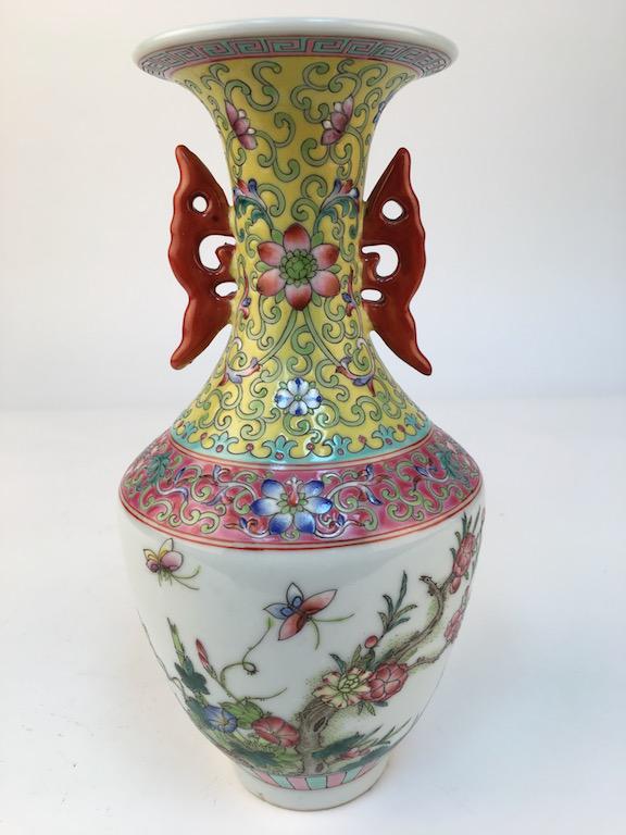 A Chinese porcelain two handle vase decorated with flowers and butterflies (1 of 5)