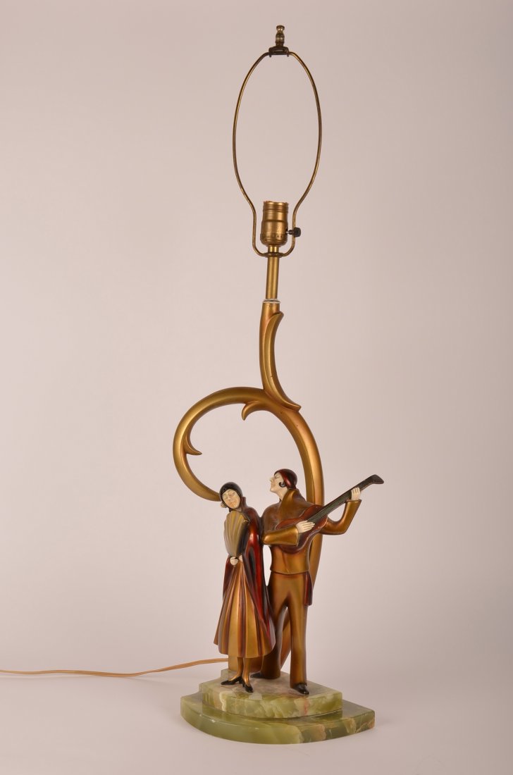Roland Paris bronze and ivory table lamp.: Roland Paris patinated bronze and ivory table lamp as two beautiful dancers. Height of figures 10 1/2"