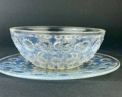 Rene Lalique (French, 1860-1954). "Asters" opalescent bowl and underplate. "Asters" opalescent bowl: Rene Lalique (French, 1860-1954). "Asters" opalescent bowl and underplate."Asters" opalescent bowl and underplate.Marked: R. Lalique France.Bowl: Height 2 1/8 inches. Diameter 5 1/4 inches. Plate: 7 i