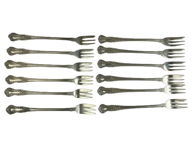Sterling silver cocktail forks 5 1/4 inches long.: Sterling silver cocktail forks 5 1/4 inches long. Total weigth 5.25 ozt.