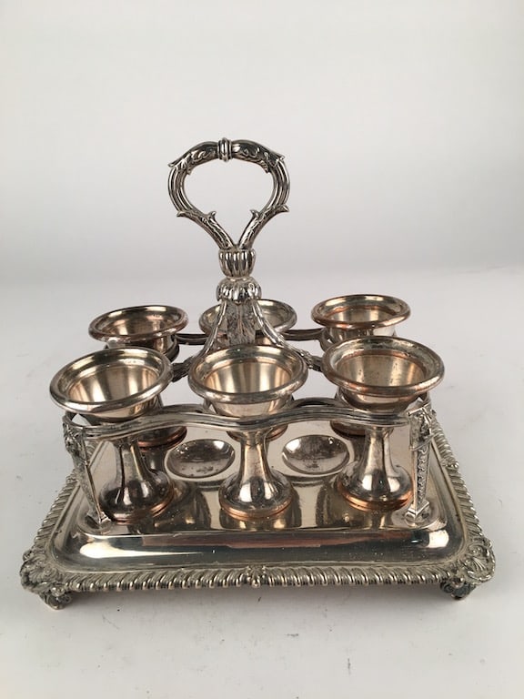 Paul Storr egg holder.: Paul Storr egg holder.Height 7 1/2 inches.Tray 6 inches x 8 1/4 inches.(The 6 egg holders themselves are not Paul Storr or sterling, just included with the holder).