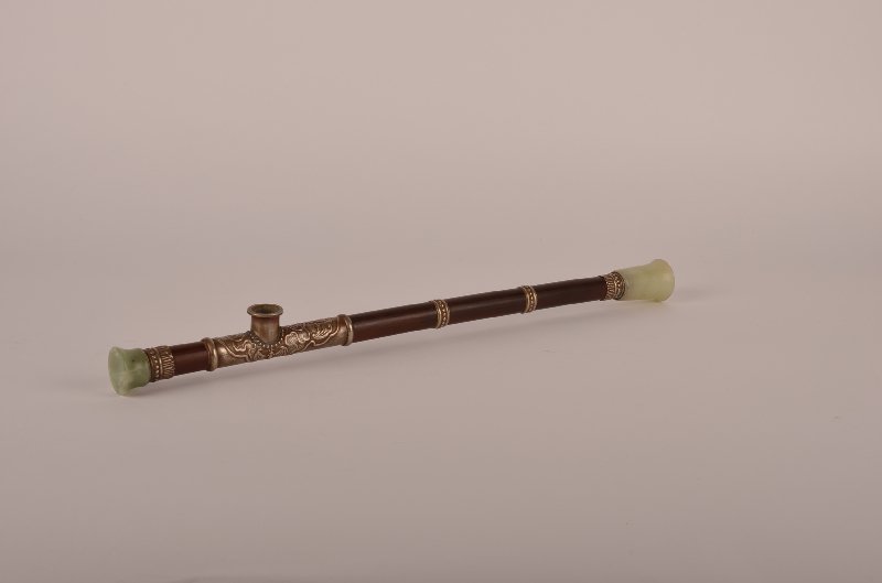 Chinese jade, bamboo and silver-mounted Opium pipe: Chinese jade, ivory and silver-mounted Opium pipe, unmarked, Qing dynasty. Length: 17 ¾"