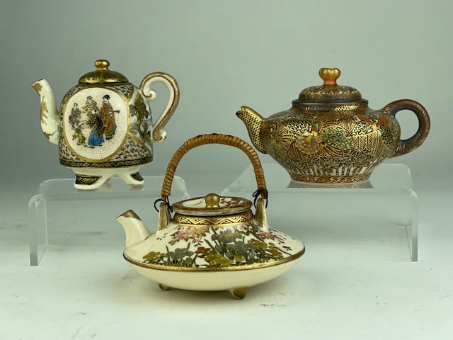 A group of three satsuma miniature teapots with attached handles (1 of 5)