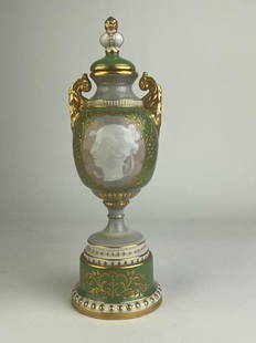 Pate-Sur- Pate Royal Vienna porcelain urn with a crown cap: Pate-Sur- Pate Royal Vienna porcelain urn with a crown cap decorated with a womans bust on a light green ground with gold enamel scrolls.Properly marked with the Beehive mark. Late 19th