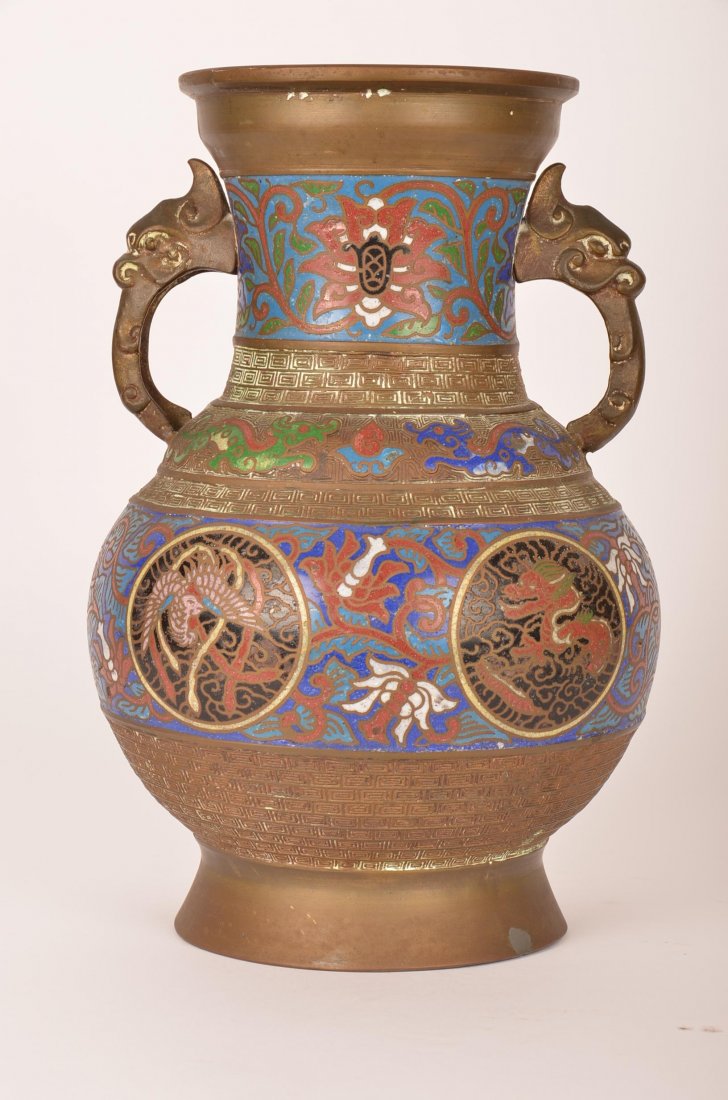 Japanese champlevé enamel and bronze vase with dra: Japanese champlevé enamel and bronze vase with dragon-form handles. H: 11 ¾
