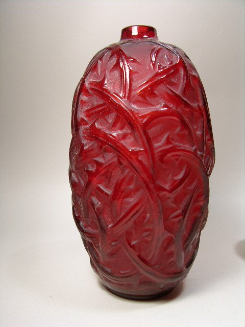 R. Lalique "Ronces" vase in deep red glass. : R. Lalique "Ronces" vase in deep red glass. Molded R. Lalique.Reference Marcilhac page 427. Height 9 1/8".