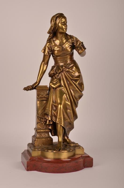 E. Bouret gold gilt bronze figure of Joan of Arc.: E. Bouret (Europe Bouret: French, 1833-1906) gold gilt bronze figure of Joan of Arc mounted on a French marble base. Overall height 18 1/4".