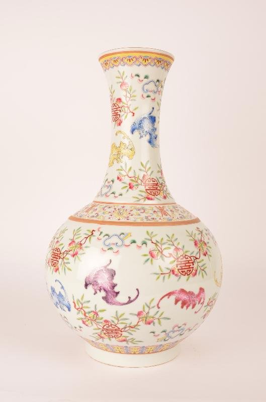Chinese famille rose porcelain 'peach and bat' vase, Gu: Chinese famille rose porcelain 'peach and bat' vase, Guangxu mark 1875-1908 and of the period. Bottle form, lappet band to gilded rim, well enameled body to show peach, bats and Shou characters. Heigh