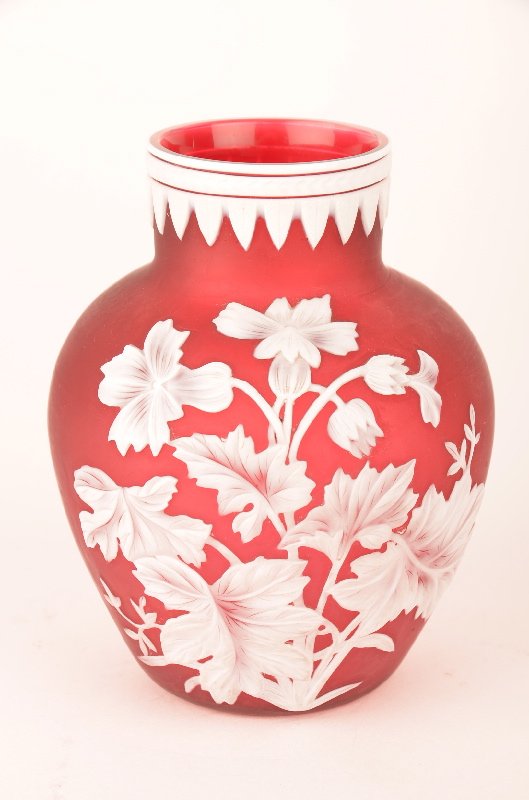 Attributed to Thomas Webb, white enamel on a red ground: Attributed to Thomas Webb, white enamel on a red ground in a boulbous form.Height 5 1/4 inches.