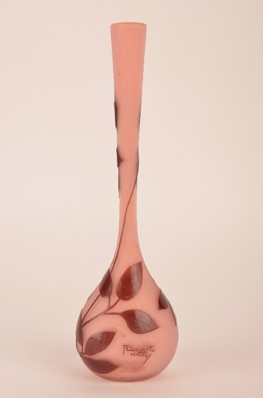 French cameo art glass vase decorated with large: French cameo art glass vase decorated with large flowers on a pink ground. Signed Delant Nancy in cameo. Height 11 1/8".