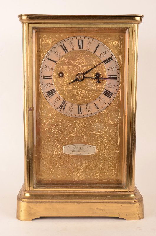 19 th Century English crystal regulator double fusee: 19 th Century English crystal regulator double fusee quarter strike with two gongs and two hammers clock. Measures 14 inches high and was made by Alex Bruce of Manchester. The engraved silvered dial.