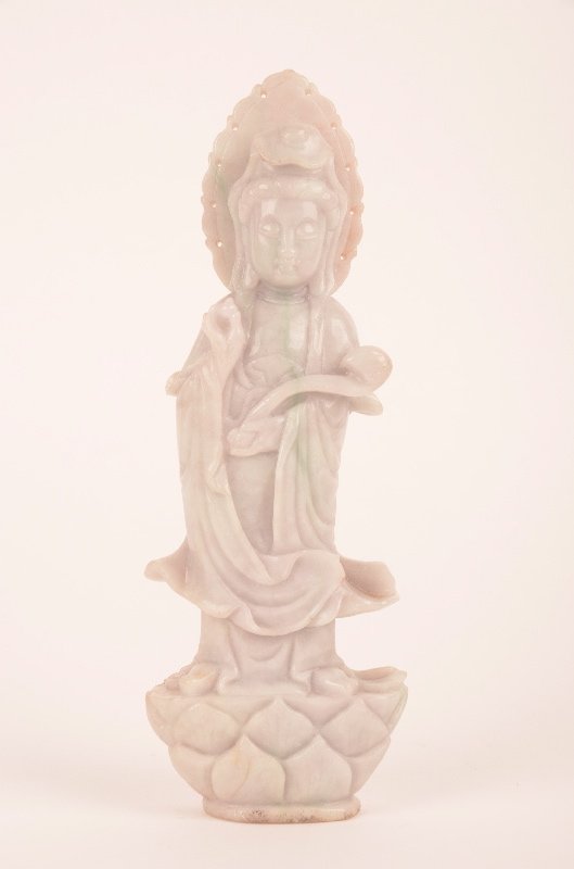 Antique carved Chinese Jadeite jade Guanyin: Antique carved Chinese Jadeite jade Guanyin holding a Ruyl and bead standing up in a bunch of leaves. Height 9 1/2 inches.