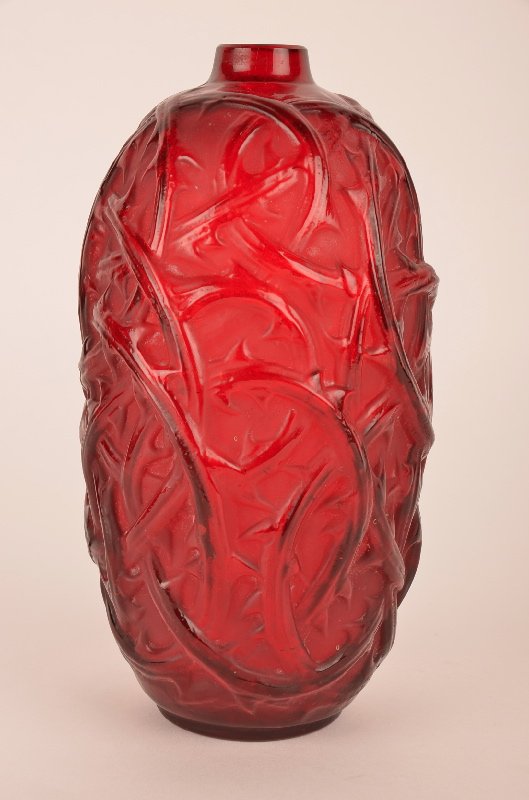Rene Lalique "Ronces" vase in deep red glass: Rene Lalique "Ronces" vase in deep red glass.Circa 1930. Height 9 1/8 inches.(This was drilled for a lamp, and the bottom hole filled).