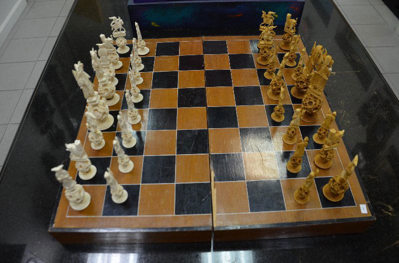 Thirty two piece carved ivory chess set with seperated: Thirty two piece carved ivory chess set with seperated lined dividers.Largest piece 7 1/2 inches.