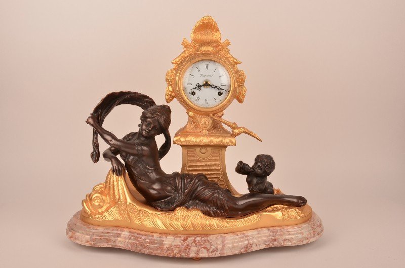 Gilt bronze clock on a marble base. (1 of 3)