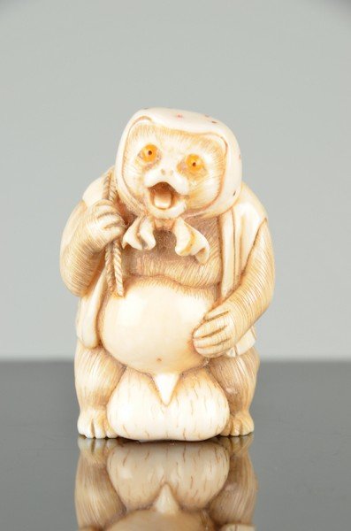 Japanese carved Netsuke of a dressed Bear (1 of 3)