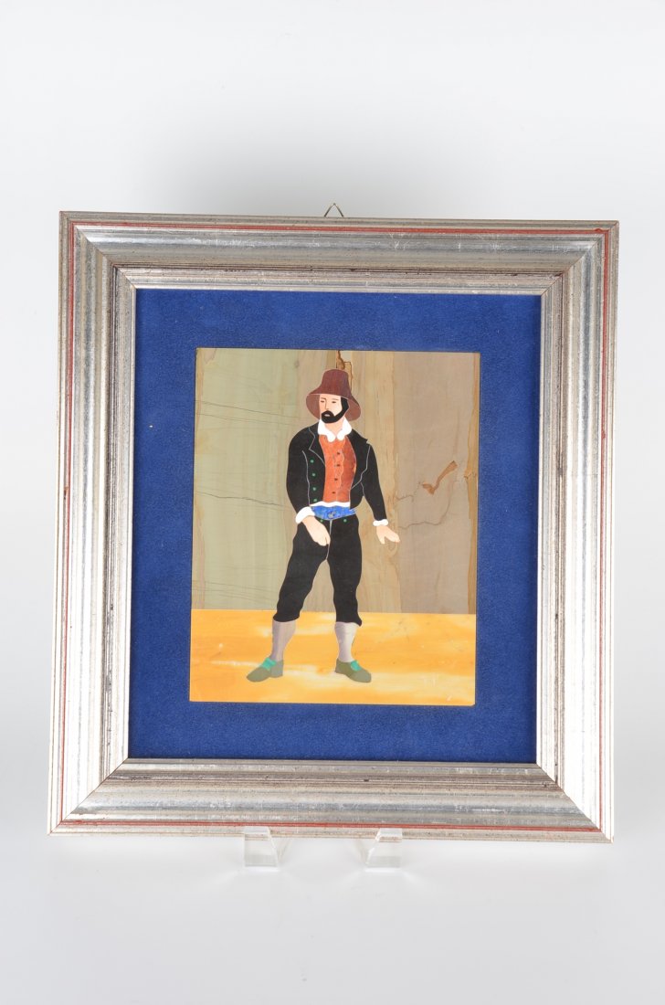 Pietra dura plaque of a man wearing a a brown hat: Pietra dura plaque of a man wearing a a brown hat standing looking off. Plaque measures 7 inches x 8 inches. Framed measures 13 inches x 14 inches.