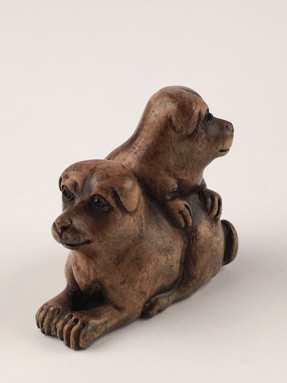 Carved Japanese Netsuke figure of two Dogs. (1 of 5)