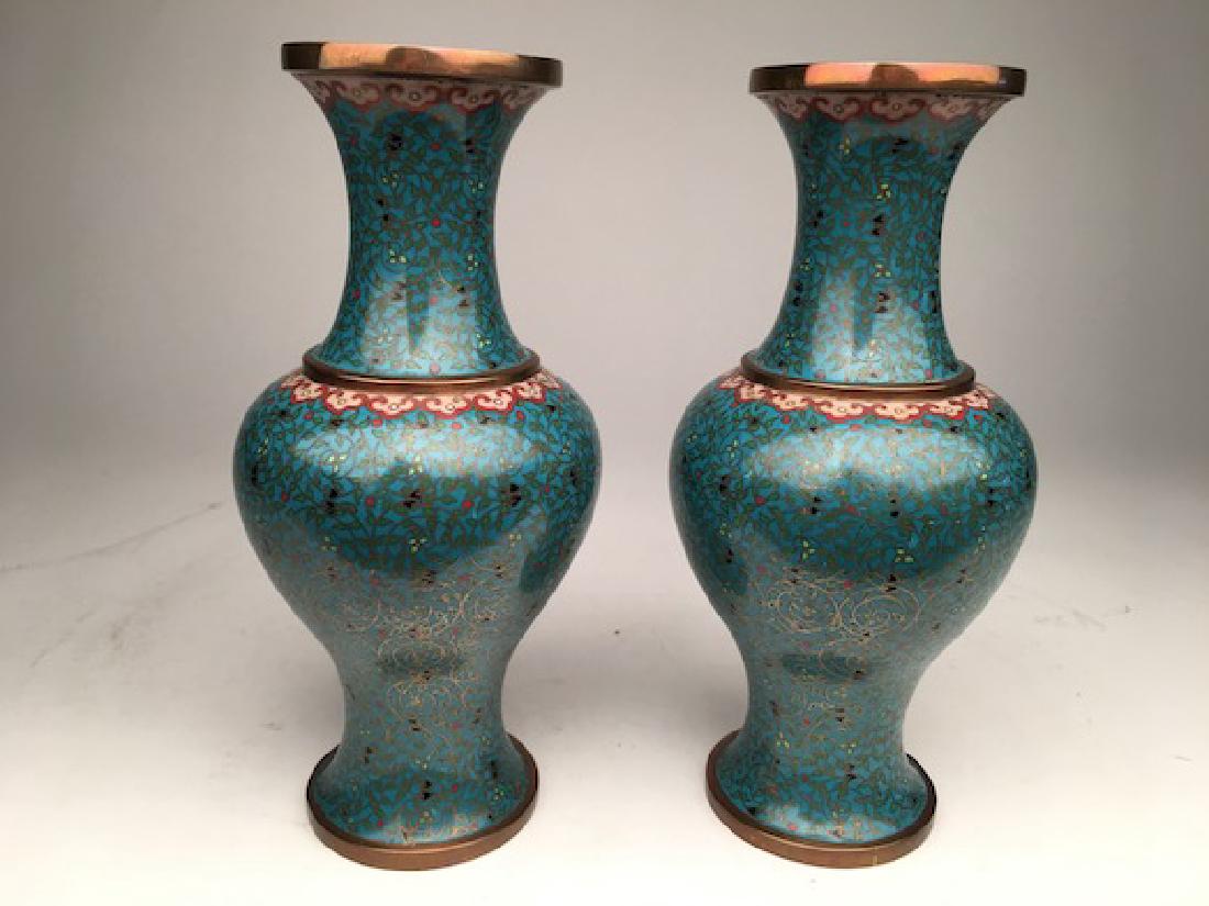 A pair of Japanese baluster shaped cloisonne vases. (1 of 3)