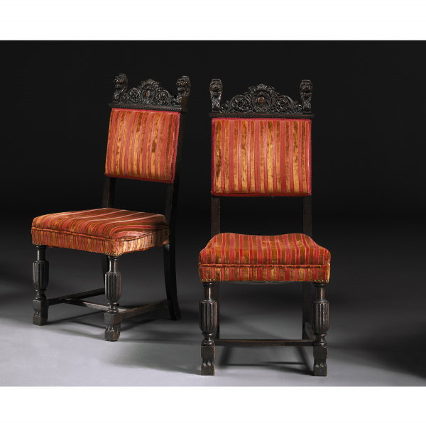 A PAIR OF RENAISSANCE STYLE STAINED OAK SIDE CHAIR