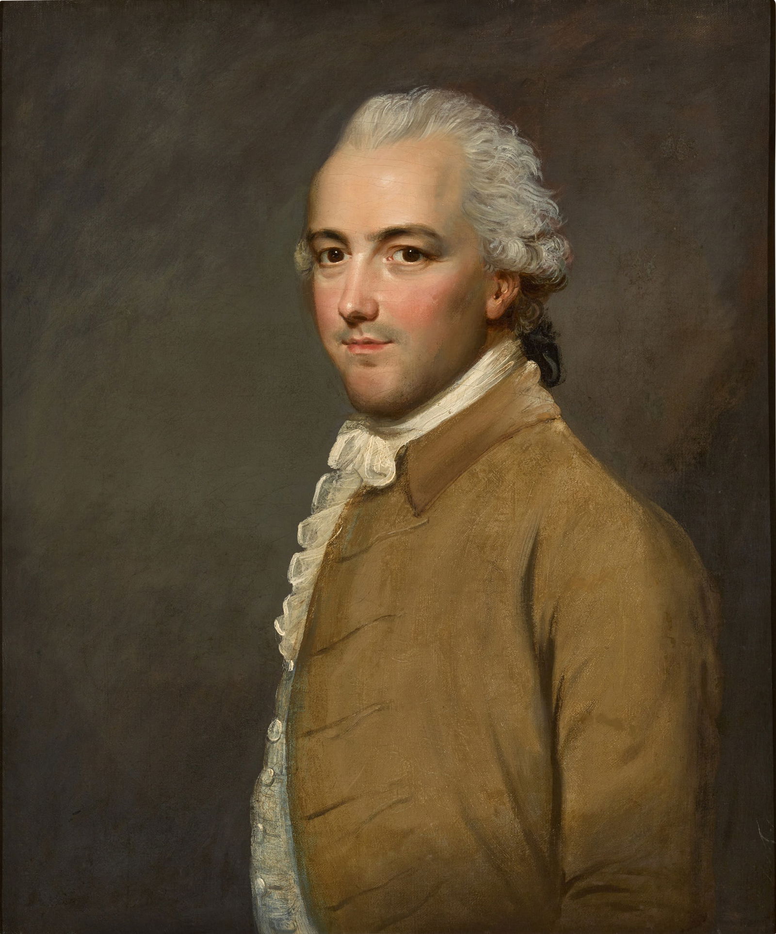 Circle of Gilbert Stuart: Circle of Gilbert Stuart Portrait of a gentleman, half-length, in a beige coat and white cravat oil on canvas unframed: 76.8 x 64.1 cm.; 30¼ x 25¼ in. framed: 92.6 x 80.2 cm.; 36½ x 31&