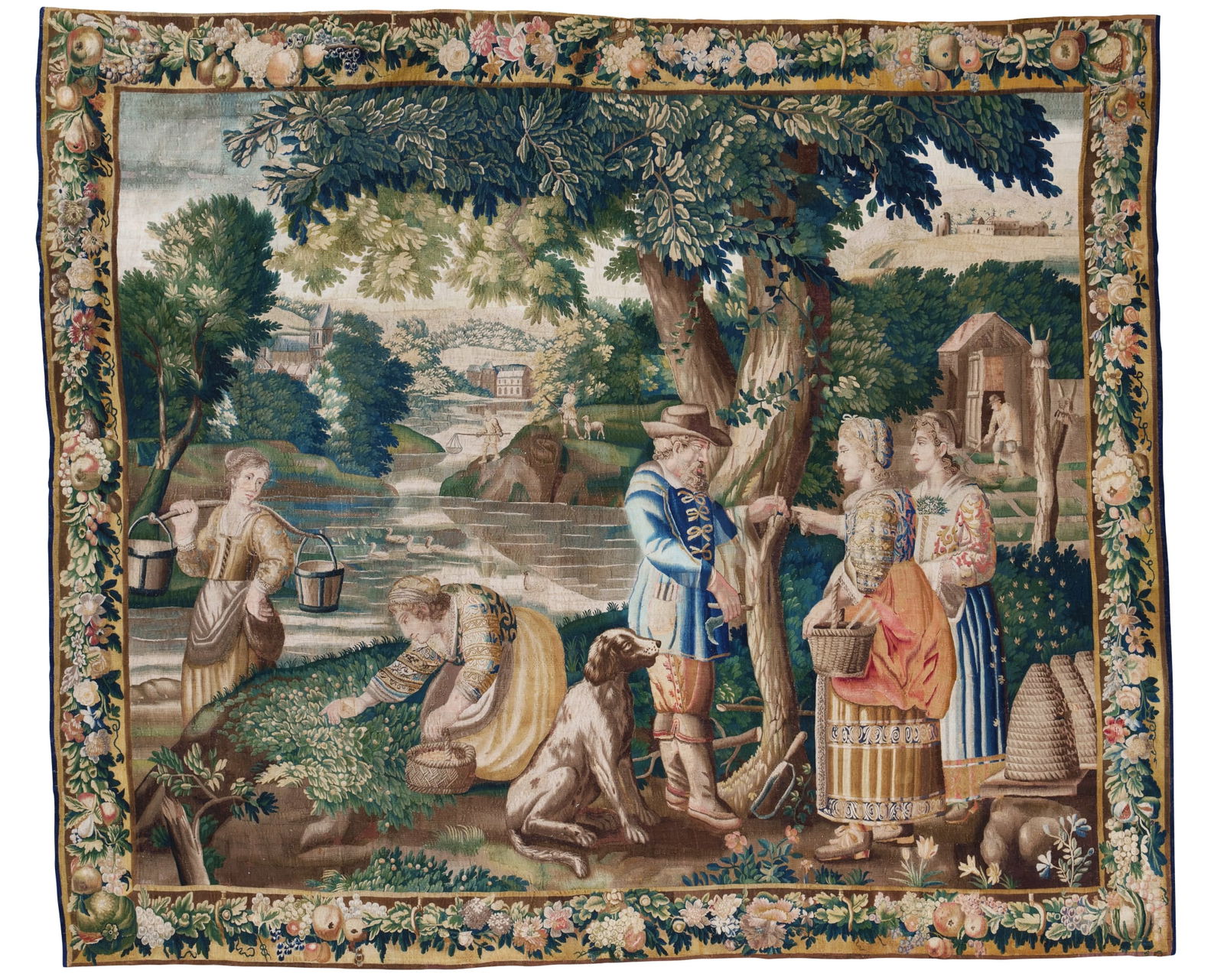A Flemish Pastoral Tapestry, after a design by Jacques Stella, Late 17th Century: A Flemish Pastoral Tapestry, after a design by Jacques Stella, Late 17th Century depicting scenes of country life, including a milk maid, berry-picker, bee-keepers and a tree-grafter silk and wool 9 f