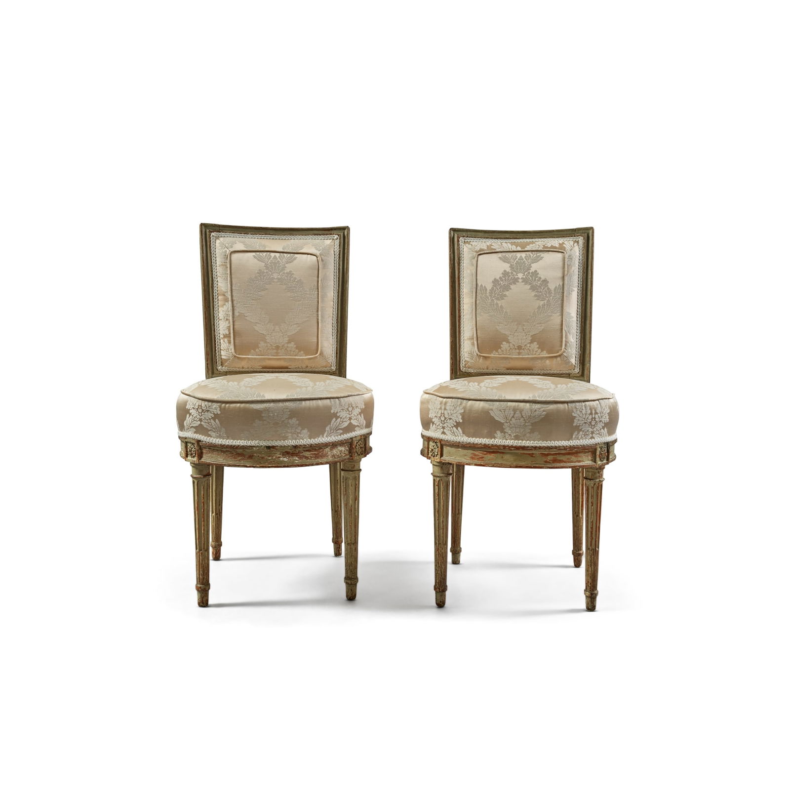 A Pair of Louis XVI Grey-Painted Beechwood Chaises en Cabriolet, by Georges Jacob, Circa 1780: A Pair of Louis XVI Grey-Painted Beechwood Chaises en Cabriolet, by Georges Jacob, Circa 1780 One Chaise Stamped G. Jacob Georges Jacob (1768-1803) maître in 1765 height 33 ½ in.; width 17 &