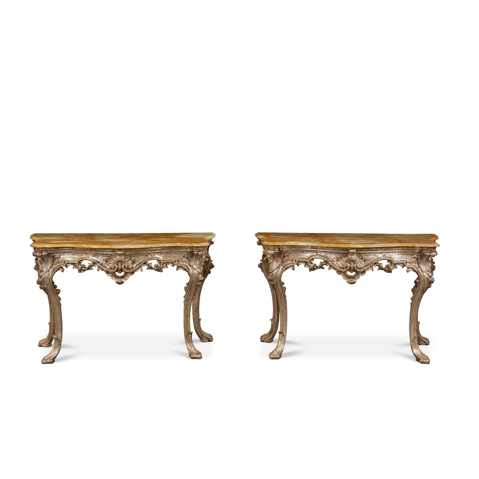 A Pair of Neapolitan Rococo Silvered Wood Console Tables, Mid-18th Century: A Pair of Neapolitan Rococo Silvered Wood Console Tables, Mid-18th Century height 35 1/2 in.; width 59 in.; depth 27 3/4 90 cm; 150 cm; 70.5 cm Provenance PROPERTY FROM A PALM BEACH INTERIOR DESIGNED