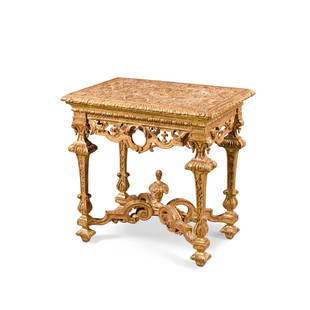 A William and Mary giltwood and gilt-gesso side table, circa 1700, attributed to the Pelletier: A William and Mary giltwood and gilt-gesso side table, circa 1700, attributed to the Pelletier family the deeply foliate-carved gilt gesso top with hatched ground, with a gadrooned edge,