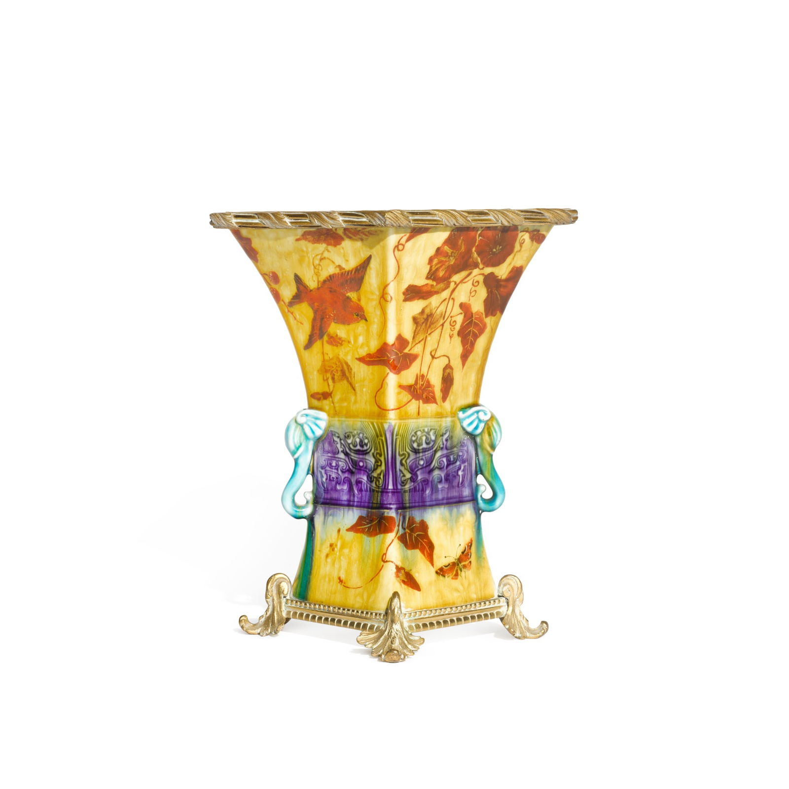 A gilt-bronze-mounted Théodore Deck vase, circa 1885: A gilt-bronze-mounted Théodore Deck vase, circa 1885 after a Chinese archaic bronze form, of lozenge section, applied with elephant head handles, moulded in low relief with stylised masks and pai