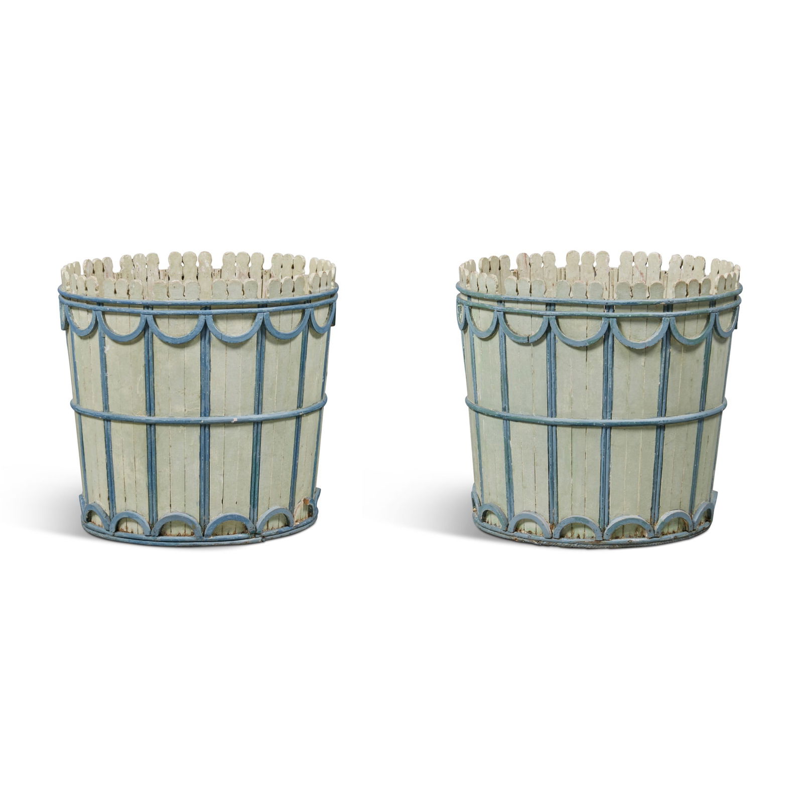 A Pair of Pale Blue and Ivory Painted Wood Jardinieres in the manner of Madeleine Castaing, 20th: height 14 1/2 in; diameter 15 1/2 in. 37 cm; 39.5 cm Provenance John and Susan Gutfreund, Paris, supplied by Henri Samuel Appartement parisien de M et Mme John Gutfreund, Christie's Paris, 28 June 201