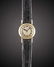 A RARE LADIES 18K SOLID GOLD CARTIER LONDON BACKWIND
