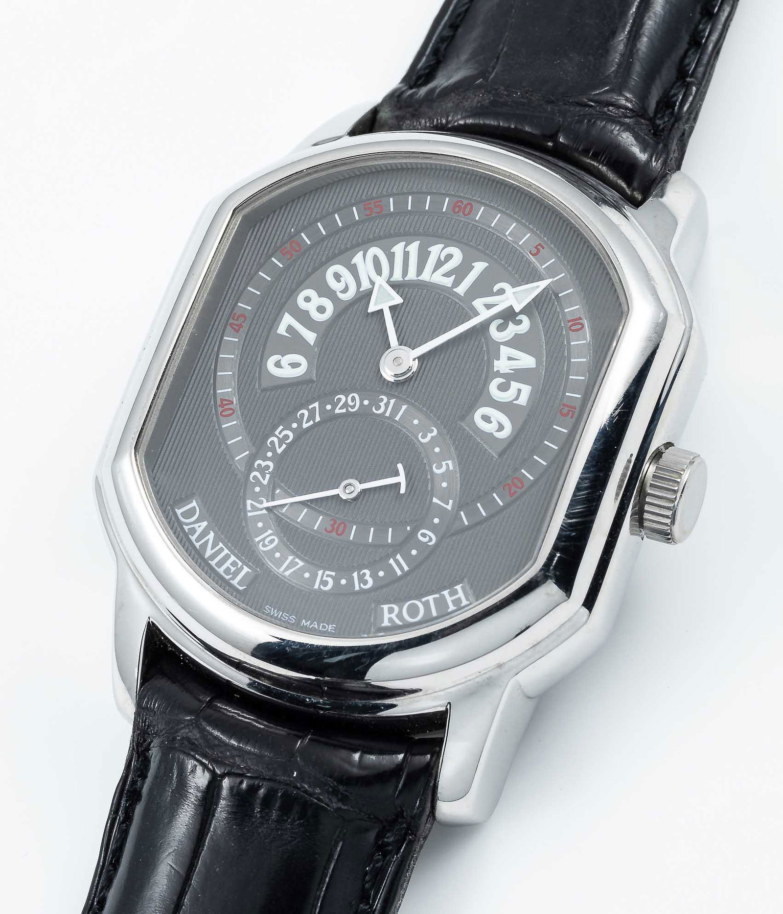 A GENTLEMAN'S STAINLESS STEEL DANIEL ROTH PREMIER RETROGRADE WRIST WATCHCIRCA 2000, REF. 807.L.10: A GENTLEMAN'S STAINLESS STEEL DANIEL ROTH PREMIER RETROGRADE WRIST WATCHCIRCA 2000, REF. 807.L.10 WITH GREY PINSTRIPE PATTERN DIALMovement: Automatic, signed Daniel Roth. Case: Width approx.