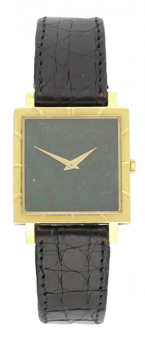 A GENTLEMAN'S 18K SOLID GOLD PIAGET WRISTWATCH CIRCA: A GENTLEMAN'S 18K SOLID GOLD PIAGET WRISTWATCH CIRCA 1980s D: Blood stone dial. M: Manual wind movement, signed Piaget. C: Two piece case with 4 screws, one in each corner, milled bezel, case signed P
