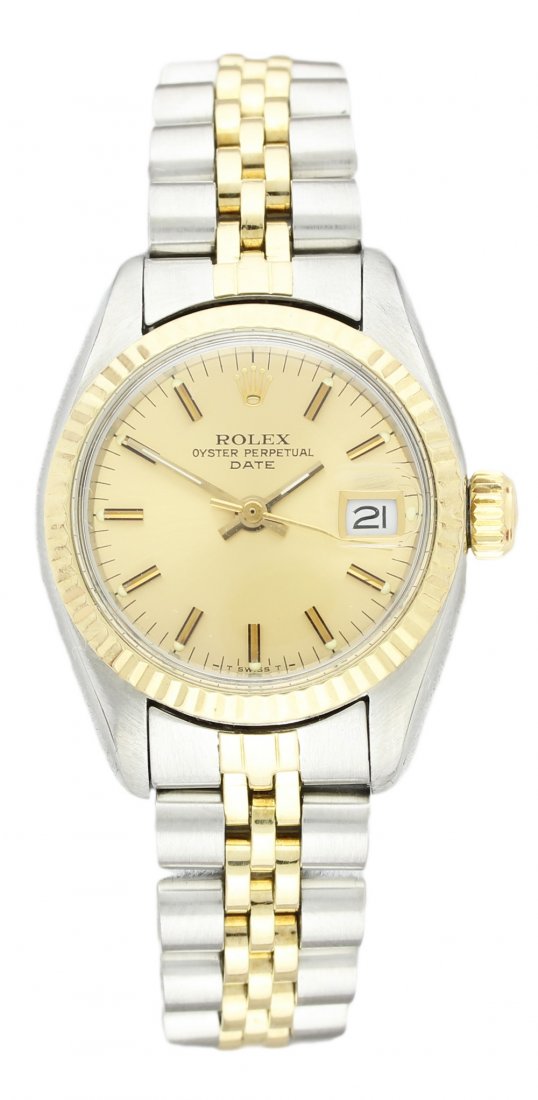 A LADIES STEEL & GOLD ROLEX OYSTER PERPETUAL DATE: A LADIES STEEL & GOLD ROLEX OYSTER PERPETUAL DATE BRACELET WATCH CIRCA 1979 D: Champagne dial with black inlaid gilt batons, date aperture. M: 28 jewel automatic movement signed Rolex, calibre 2030. C